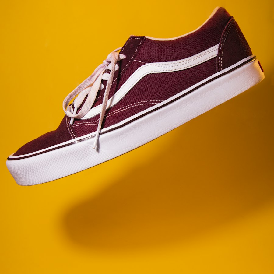 Burgundy canvas skate shoe with white sole on yellow